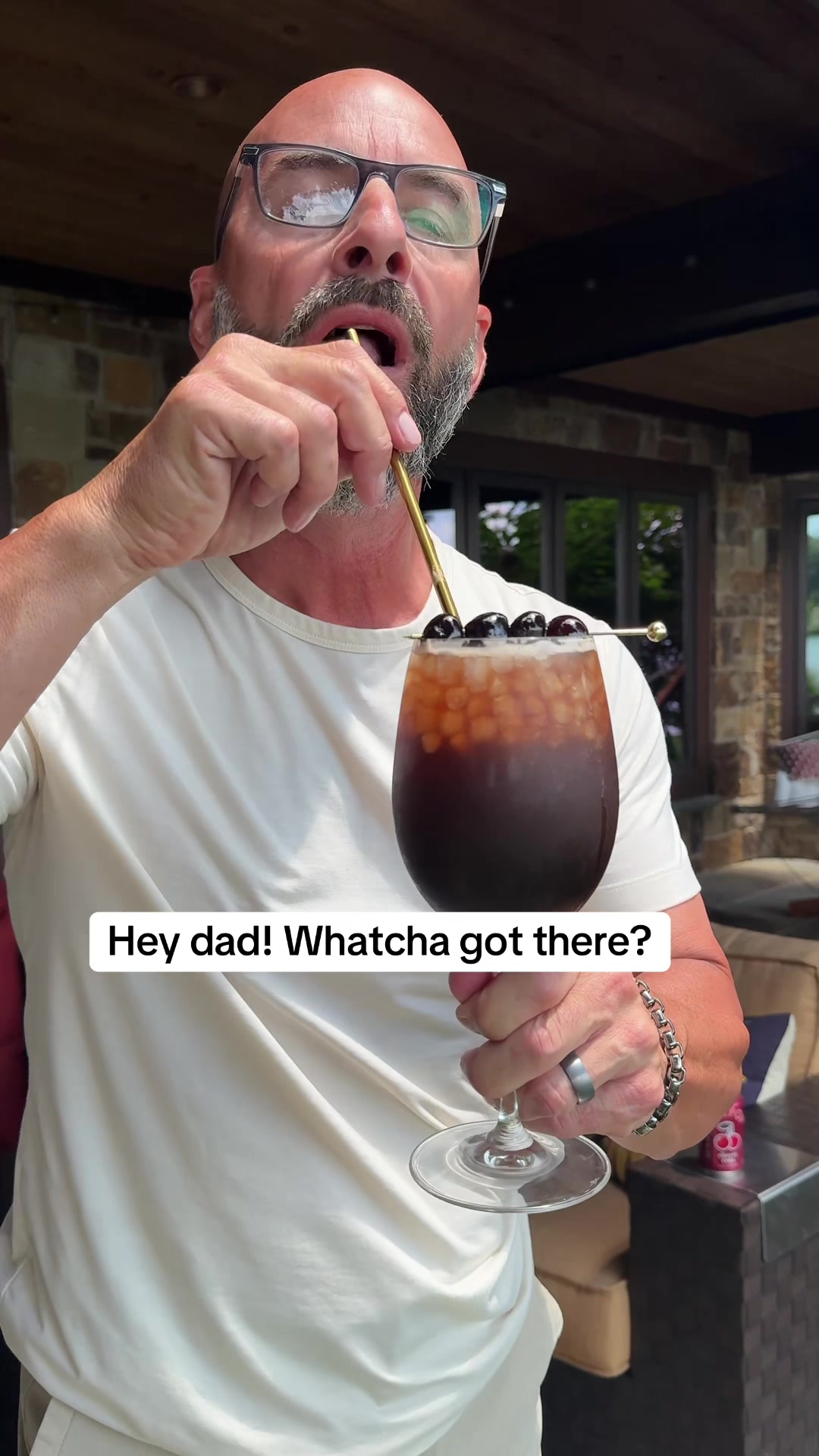 TikTok post by @johnrondi for OLIPOP. Caption reads: [...] Espresso Martini Spritz 🍒 🥂 @OLIPOP....