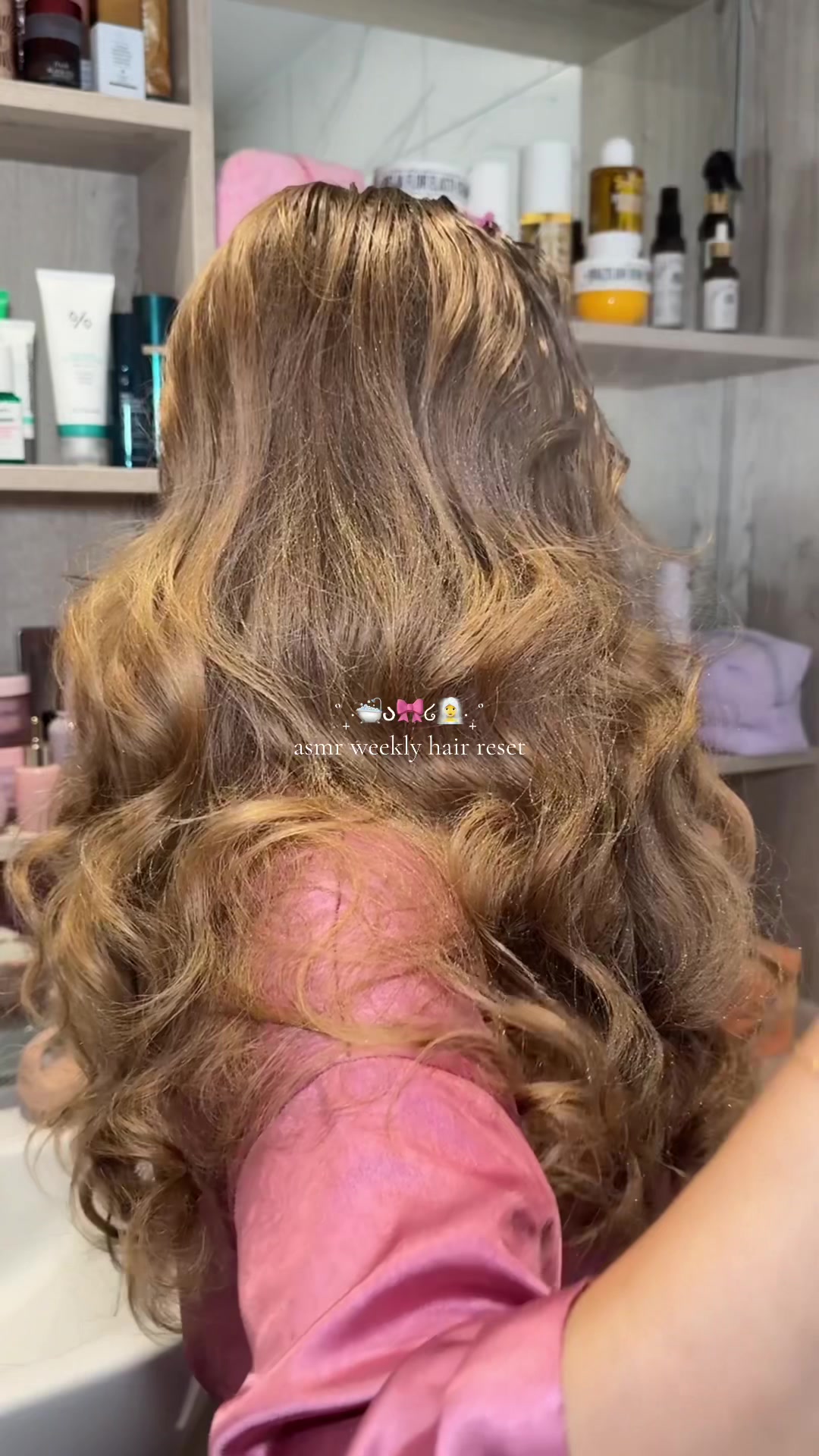 TikTok post by @by.emmaleah for Cocoandeve. Caption reads: asmr hair reset 🫧🧖‍♀️🎀 nothing quite like....