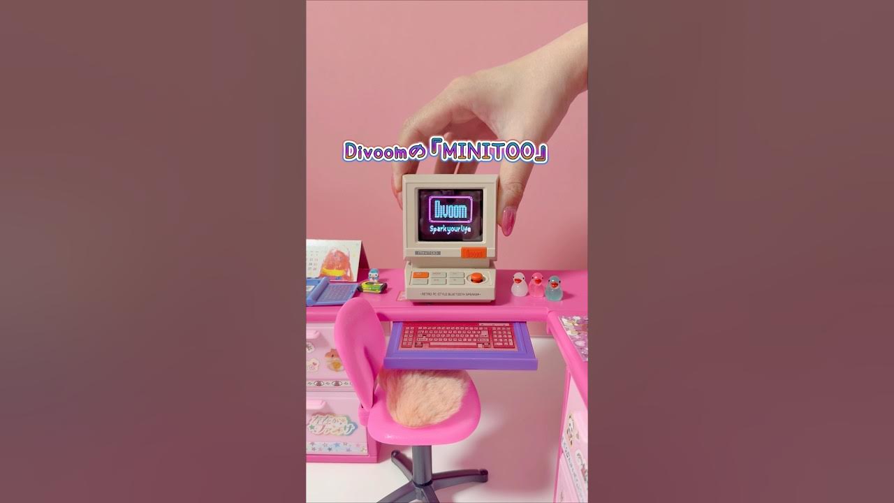 YouTube post by @平成女子めぐ for Divoom. Caption reads: Divoom MINITOO

🔗Amazon
https://amzn.to/4aELZTz....