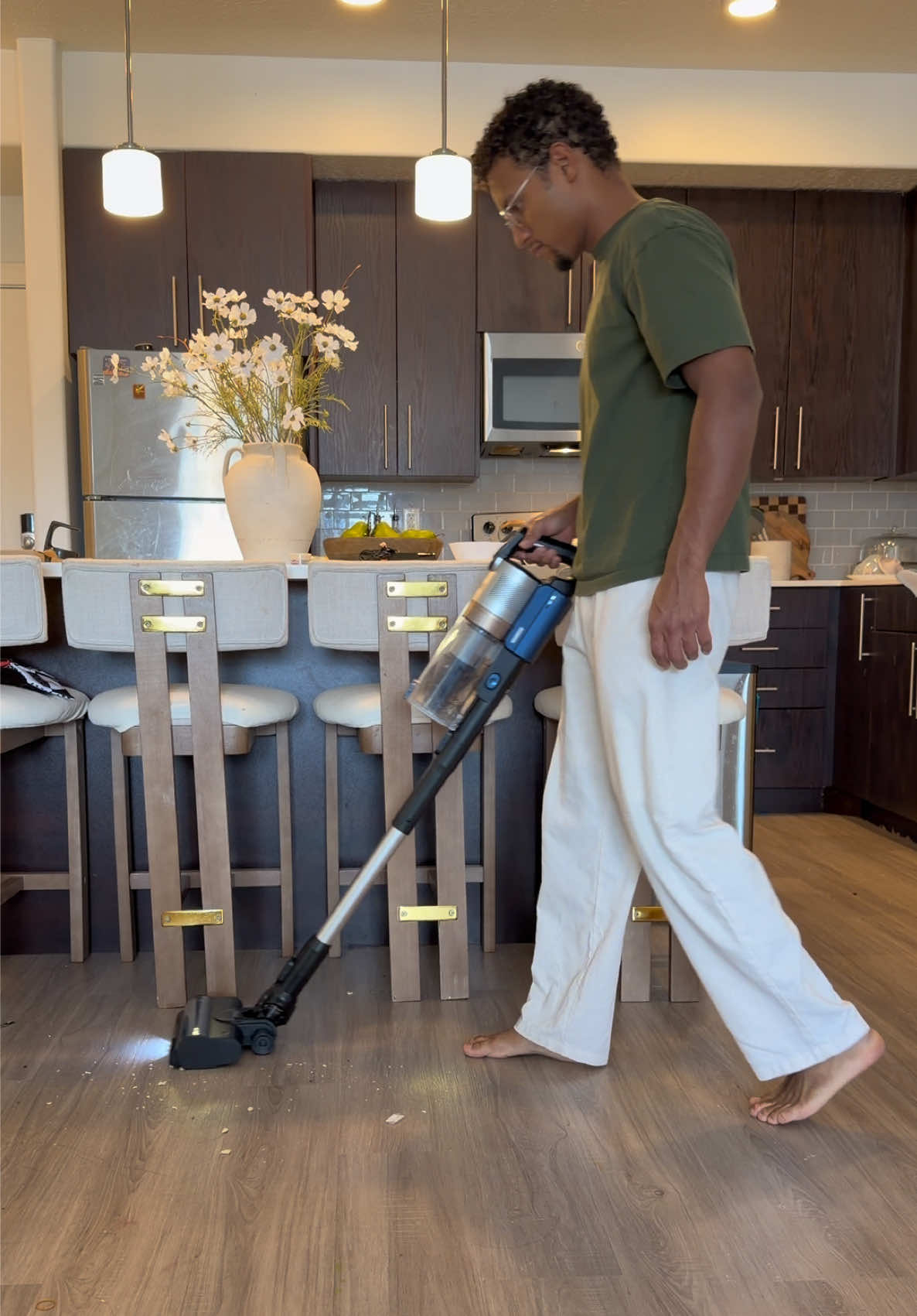 TikTok post by @lafamiliareale for Levoit. Caption reads: Everyone in cleaning mode before Mom gets home 😅....