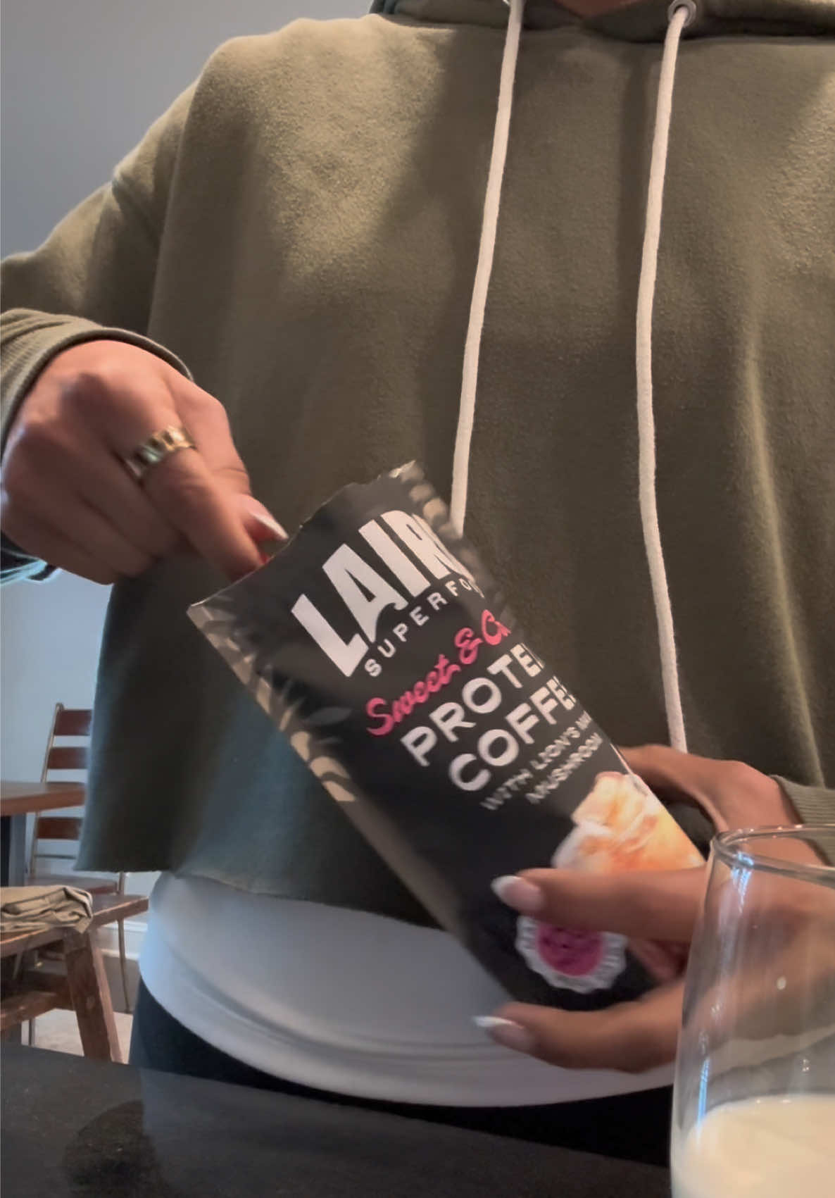 TikTok post by @l_garciaaa01 for Laird Superfood. Caption reads: Sip. Fuel. Conquer the day ☕️✨💪🏽 #lairdsuperfood....