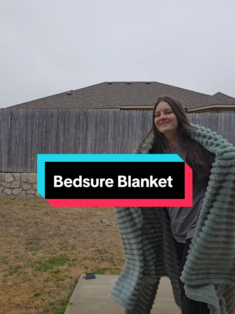 TikTok post by @ashleysmusthaves for Bedsure Home. Caption reads: Best Blanket Ever!!! It's so dang comfy! @Bedsure....