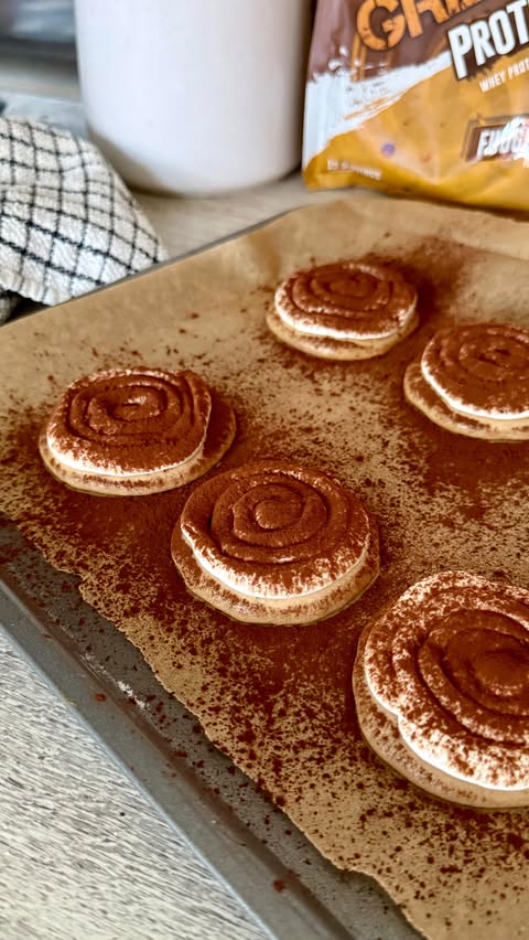 Instagram post by @kirstyfletcher for Grenade. Caption reads: Tiramisu protein cookies😍☕️🍫the perfect high....