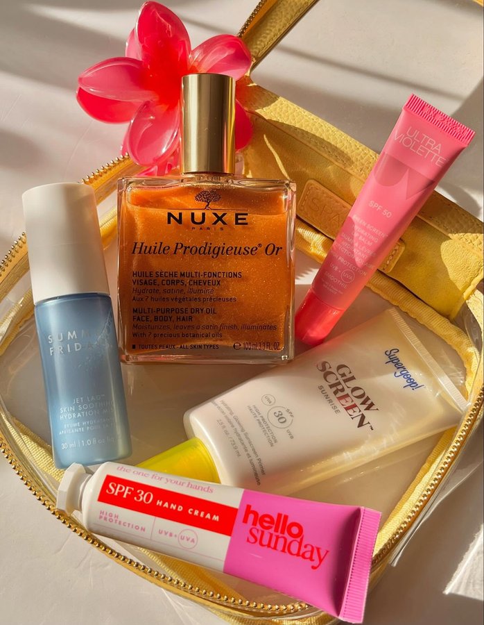 Instagram post by @beautyloveswithcj for NUXE. Caption reads: Beach essentials day two! Spot any favourites?....