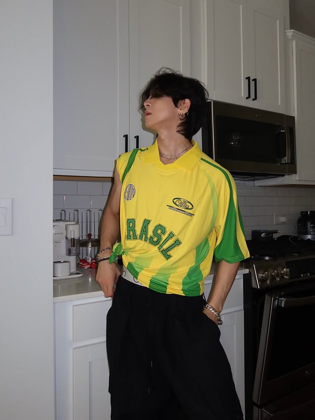 Instagram post by @_jjang.e for boohooMAN. Caption reads: #ad Who are you cheering in World Cup?....