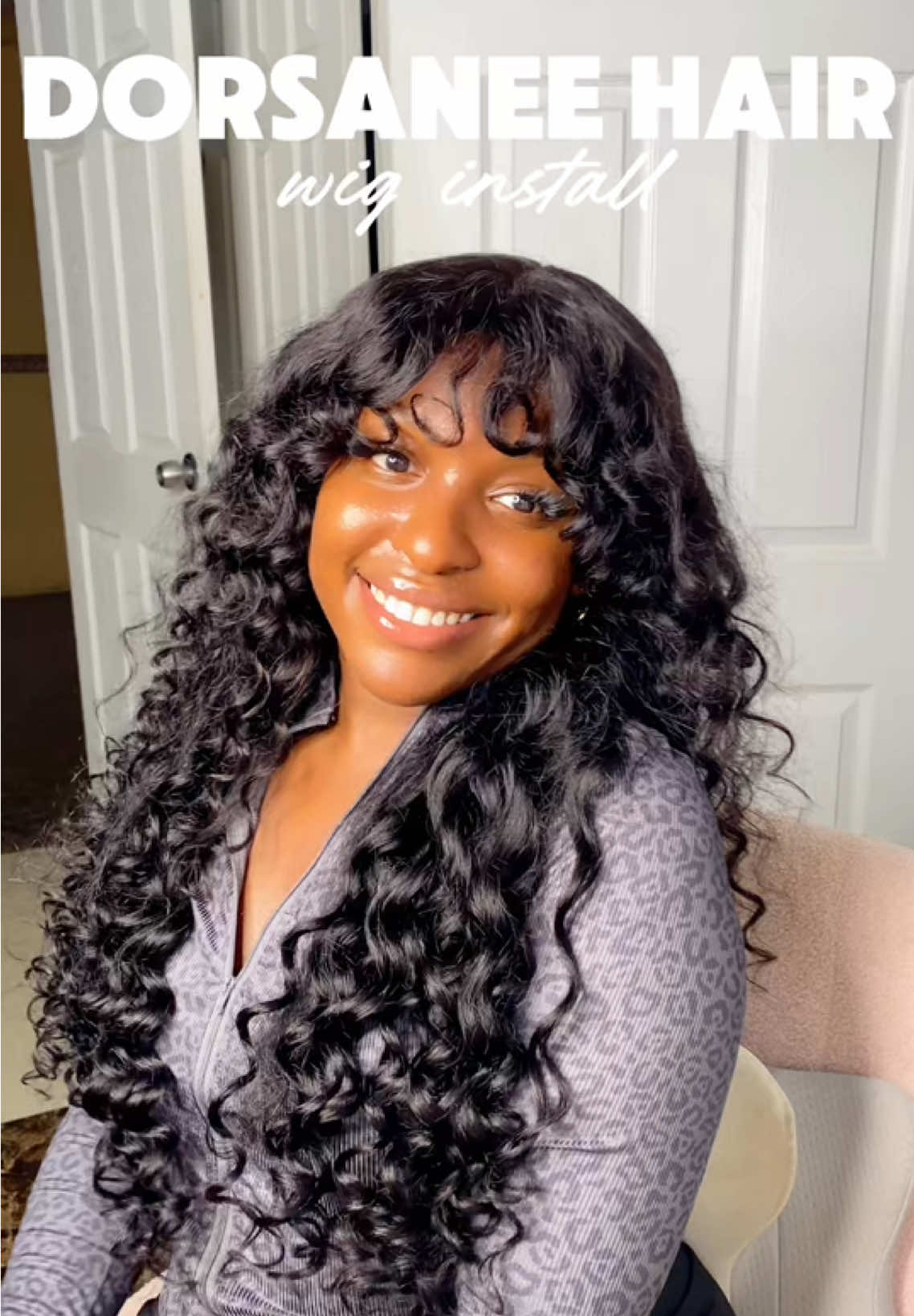 TikTok post by @idojann for Dorsanee Hair. Caption reads: [...] loose curly bang wig in 26 inches @Dorsanee....