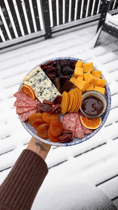 Instagram post by @thatcheeseplate for High Camp Flasks. Caption reads: BOARD + BEV PAIRING: smoky maple whisky sour....