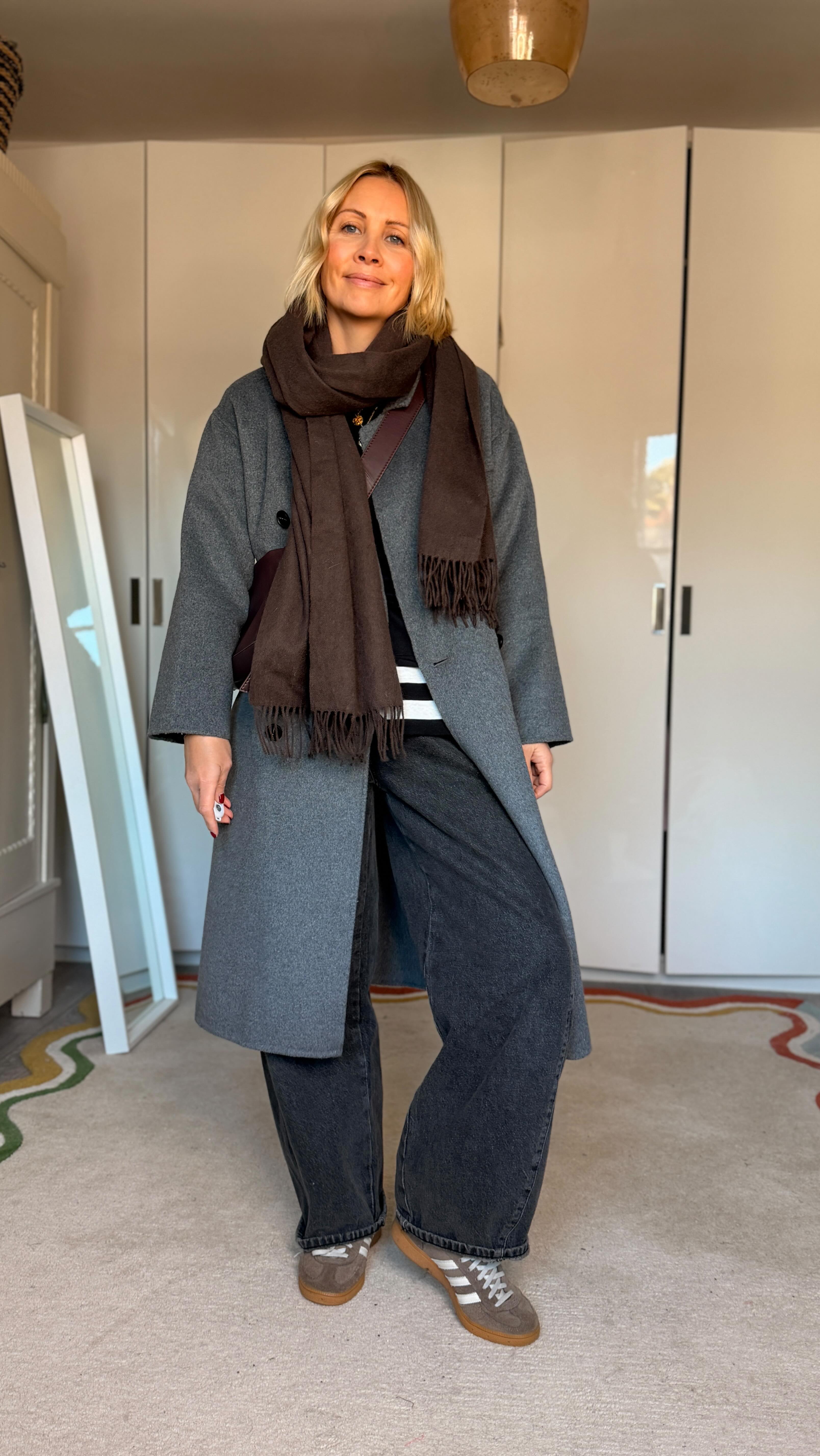 Instagram post by @ashley.dainty for Glassworks London. Caption reads: Outfit repeating this week for half term and....