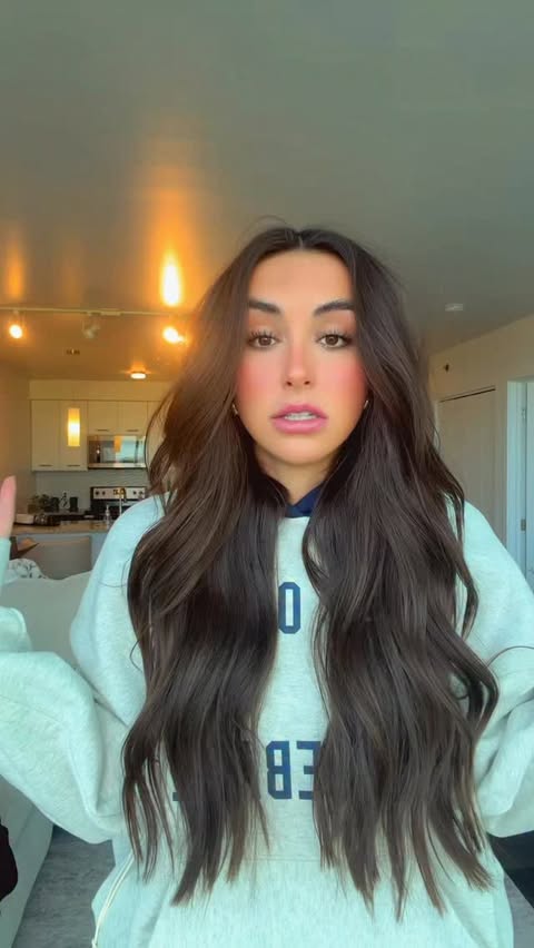 Instagram post by @gianna_girardi for Fanatics. Caption reads: OBSESSED! @fanatics @essentials #GiftedByFanatics....