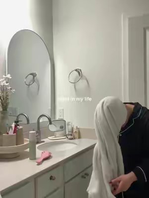 TikTok post by @nicoleguitiann for Divi Scalp & Hair Health. Caption reads: nighttime routine with @DIVI 🤍✨ use code NIKKIRG....