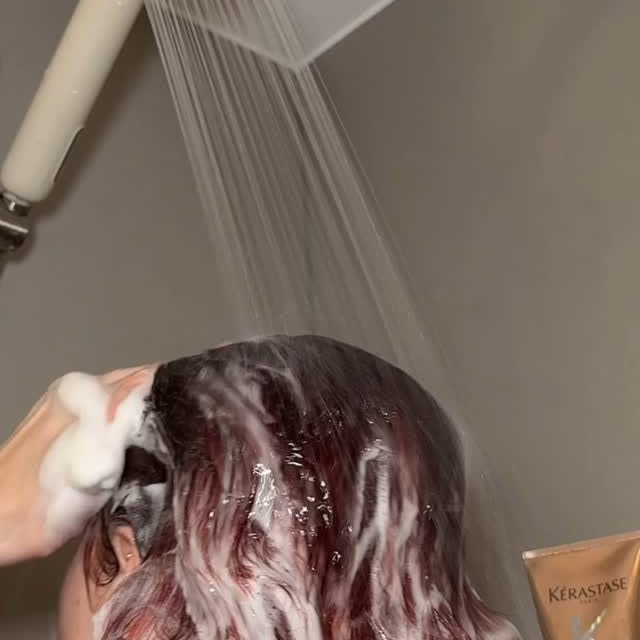 Instagram post by @youglowgrrl for living proof. Caption reads: Haircare routine to make your hair look glossy &....