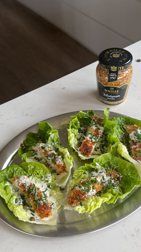Instagram post by @coconutandbliss for La Maison Maille. Caption reads: Crispy chicken caesar bites, made into a....