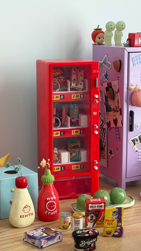 Instagram post by @markp_ for MGA’s Miniverse. Caption reads: Every desk needs a mini vending machine! 🍬🍫....