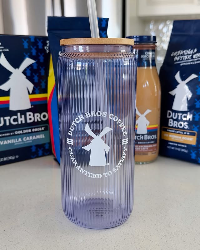Instagram post by @morganchomps for Dutch Bros Coffee. Caption reads: #ad @dutchbroscoffee Grabbing Dutch At Home....