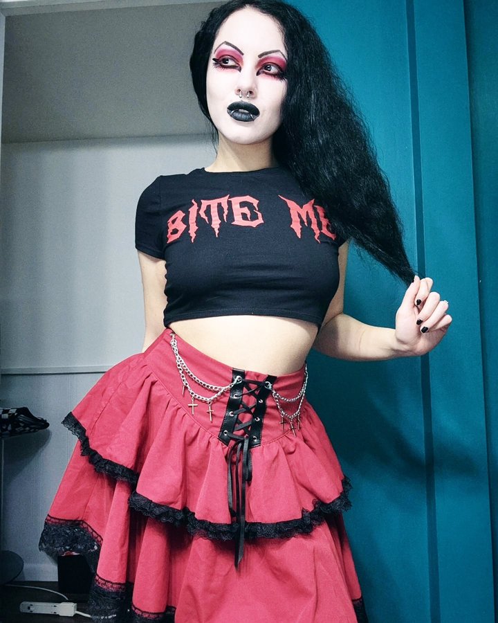 Instagram post by @xmemenoirx for VampireFreaks. Caption reads: [...] love my new "Bite Me" crop top from....