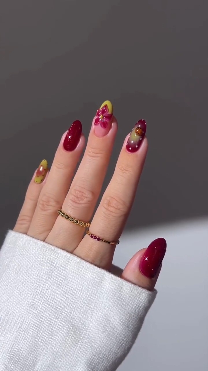 Instagram post by @beetles_community for BeetlesGelPolish. Caption reads: 🥀🐞🍂 A pop of luck, a touch of burgundy fall....