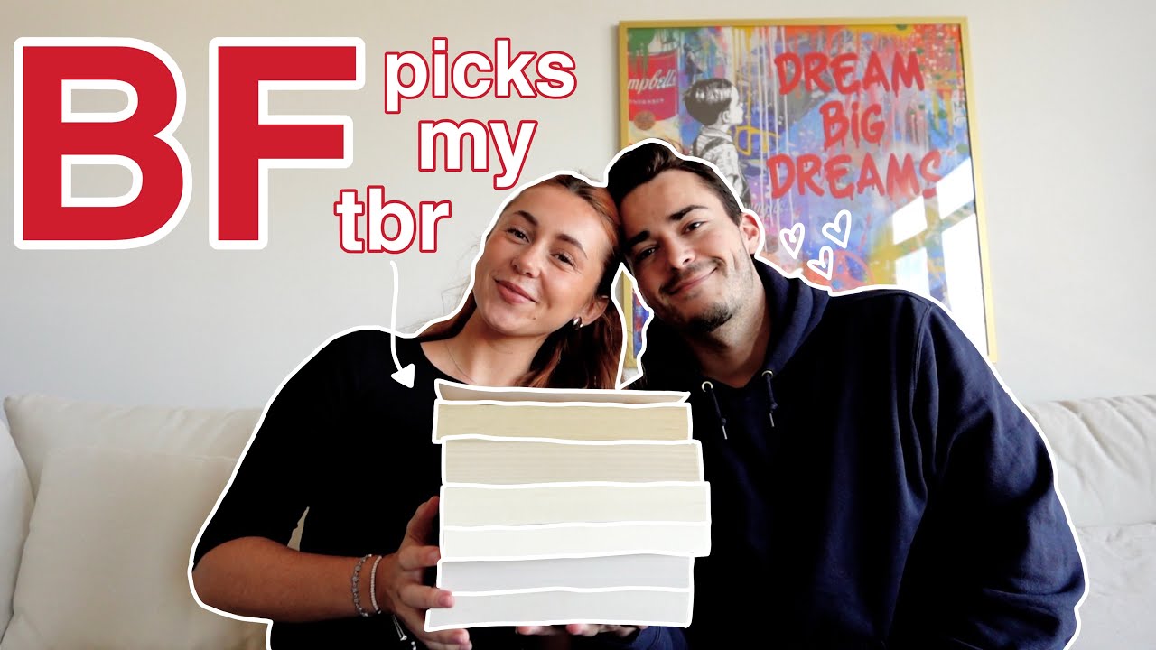 YouTube post by @SaraCarrolli for BookoftheMonth. Caption reads: my boyfriend chooses my december tbr! *bookmas day....