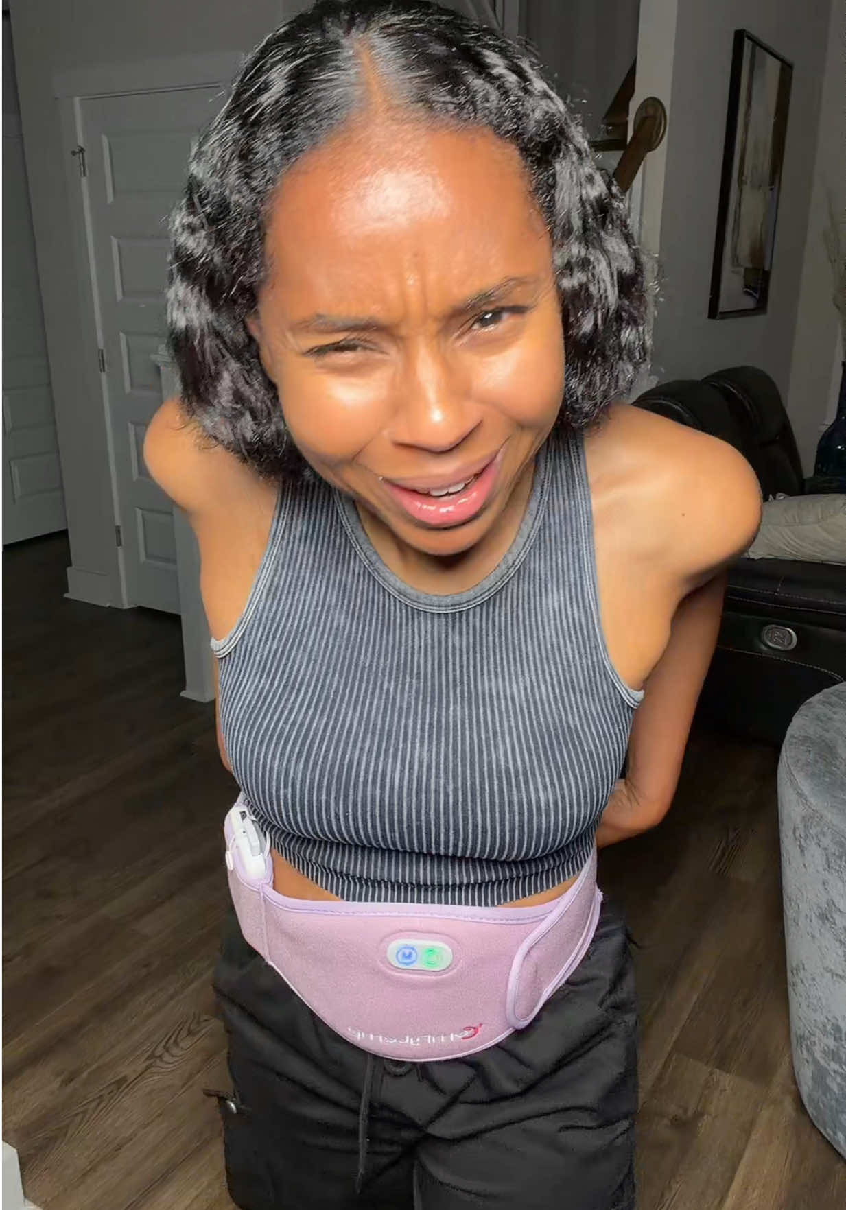 TikTok post by @1monicathomas for Comfytemp. Caption reads: [...] #portableheatingpad #cramprelief....