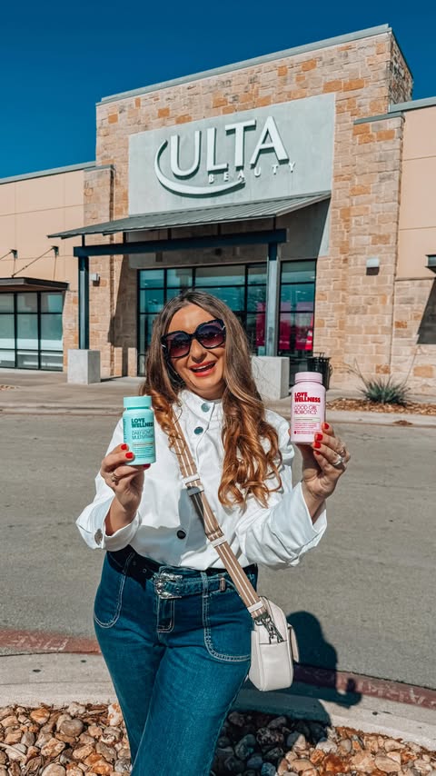 Instagram post by @travelwithherstyle for Love Wellness. Caption reads: [...] 🏃‍♀️ for my wellness must-haves:....