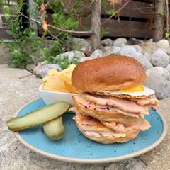 Instagram post by @mattdeanpettit for Cobs Bread. Caption reads: [...] COBS BBQ Roasted Peameal Bacon Stack!....