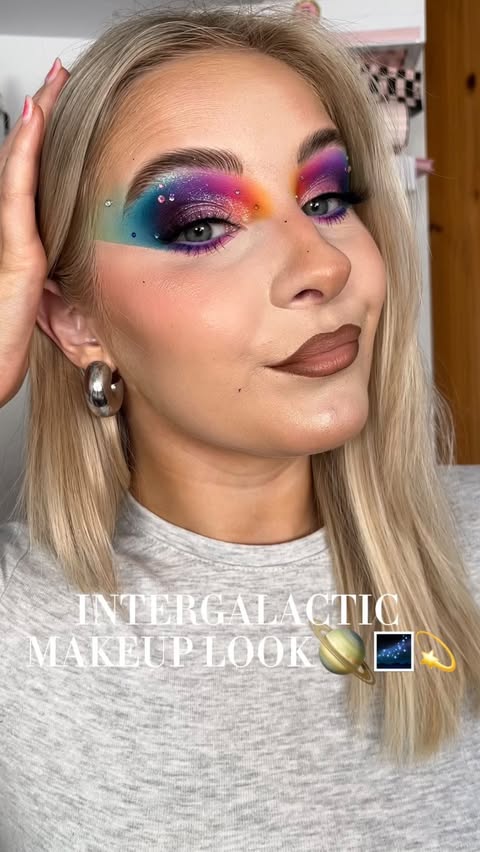 Instagram post by @meganwmua for Doll Beauty. Caption reads: 𝐈𝐍𝐓𝐄𝐑𝐆𝐀𝐋𝐀𝐂𝐓𝐈𝐂🪐🌌💫 the more i look....