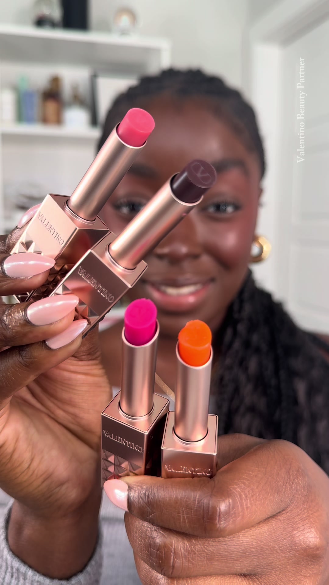 TikTok post by @ayanahyman for Valentino Beauty. Caption reads: #ad Trying all 4 of the new @Valentino.Beauty....