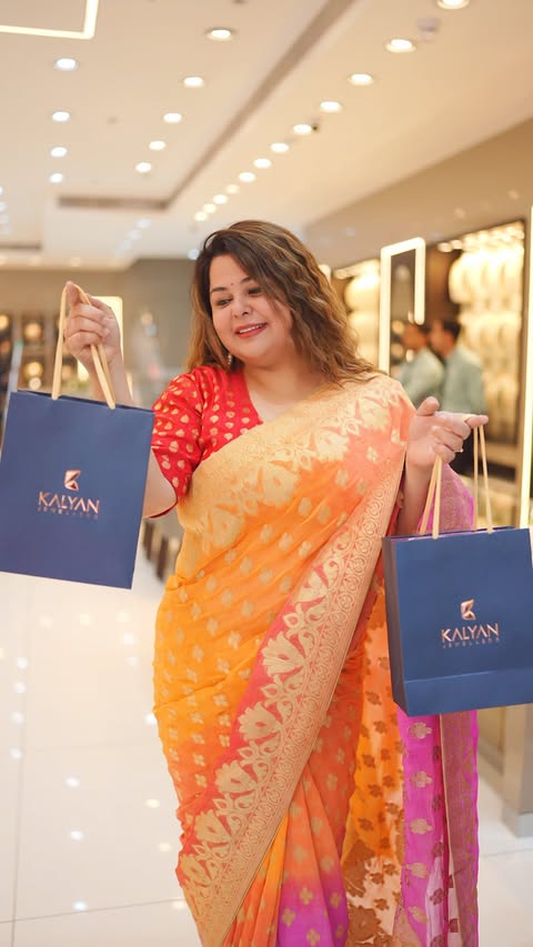 Instagram post by @bling_bychandni for Kalyan Jewellers. Caption reads: [...] the #NewlyUpgradedFlagshipStore of....