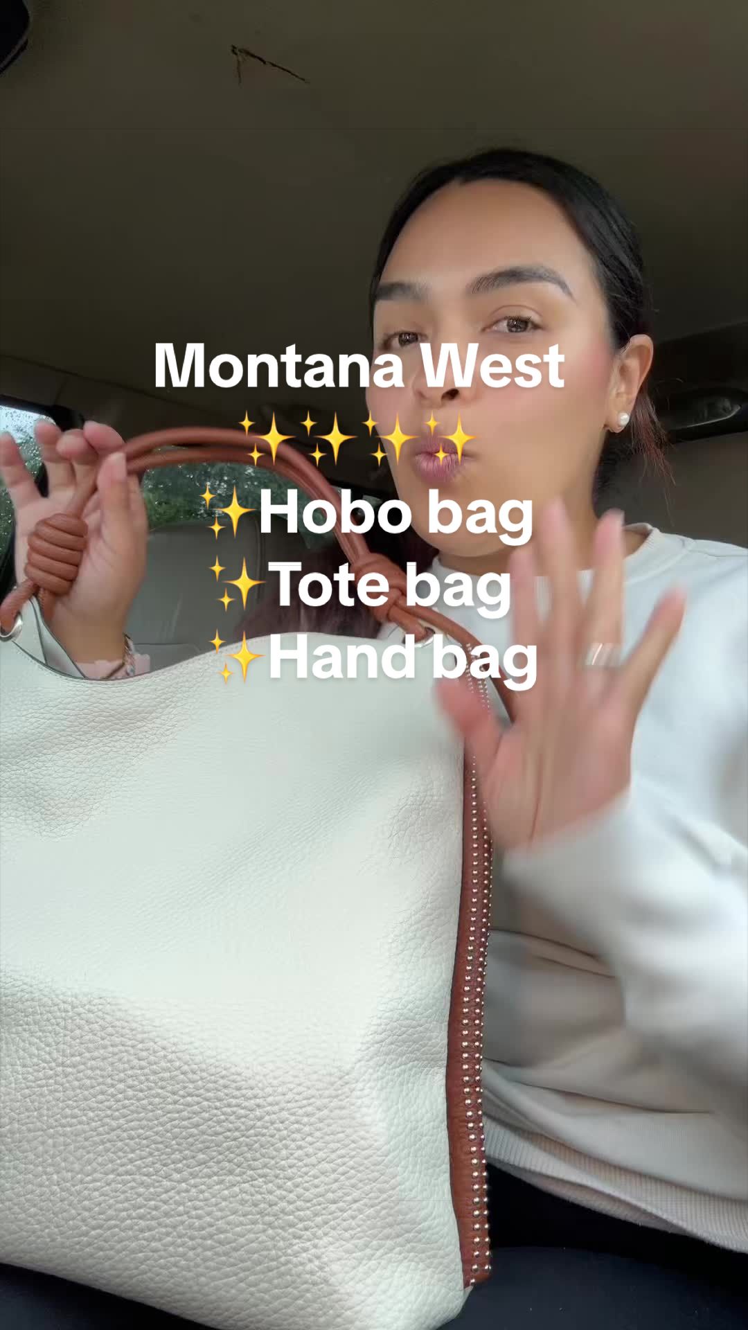 TikTok post by an influencer for Rustic Charm Bootic. Caption reads: [...] Handbag with Knot Strap @Rustic Charm Bootic....