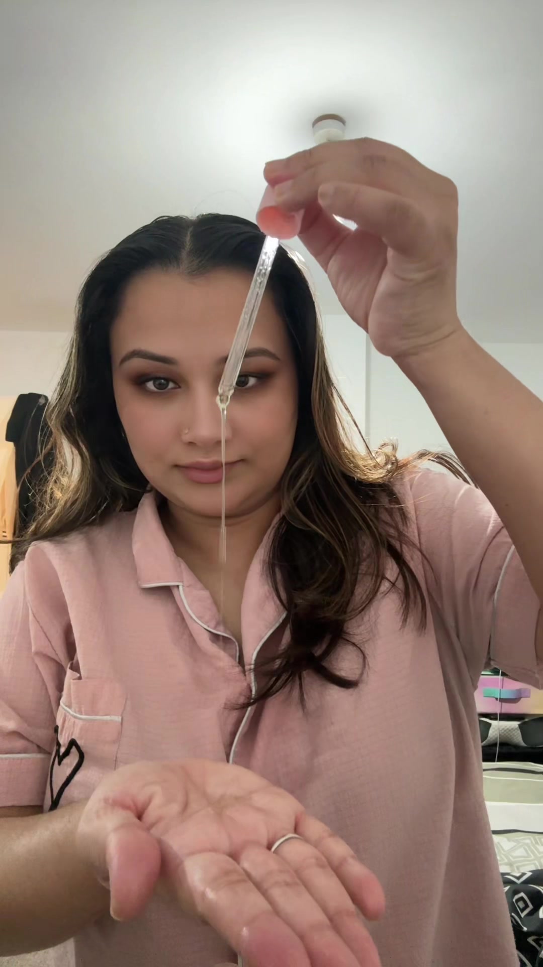 TikTok post by @tiathemakeupartist for Delhicious Body. Caption reads: #hairoiling #routine #delhicious #blackfriday....