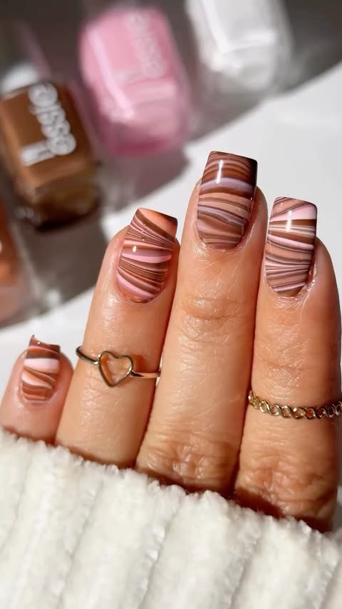 Instagram post by @kt_tk1 for essie. Caption reads: [...] I turn into nails next? Colors used @essie....