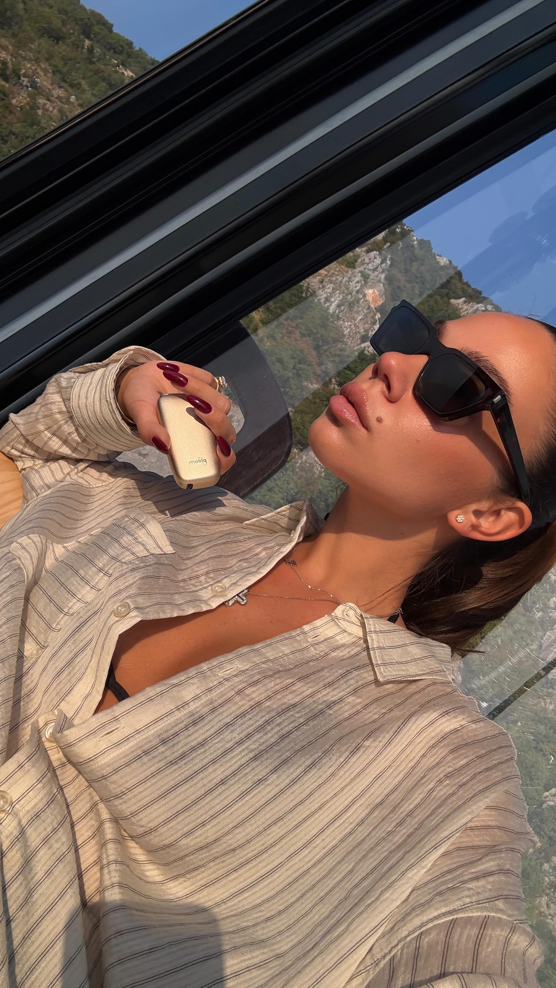 Instagram post by @who.is.mm for Ploom. Caption reads: All fun & games at my first @ploom.me vacation. My....