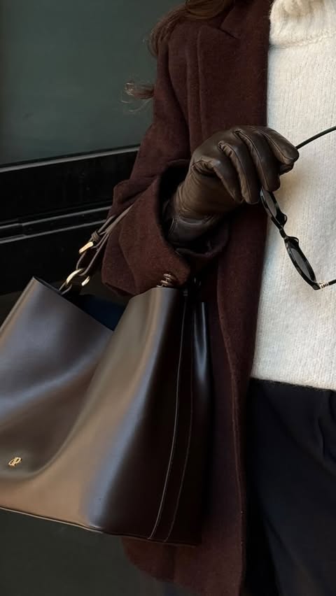 Instagram post by @marissayaps for Theory. Caption reads: everything in my capsule wardrobe is linked in my....