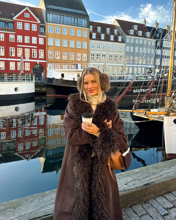 Instagram post by @amanda_sand for New Yorker. Caption reads: [...] time in Copenhagen has begun ✨ ❄️ 🎄....