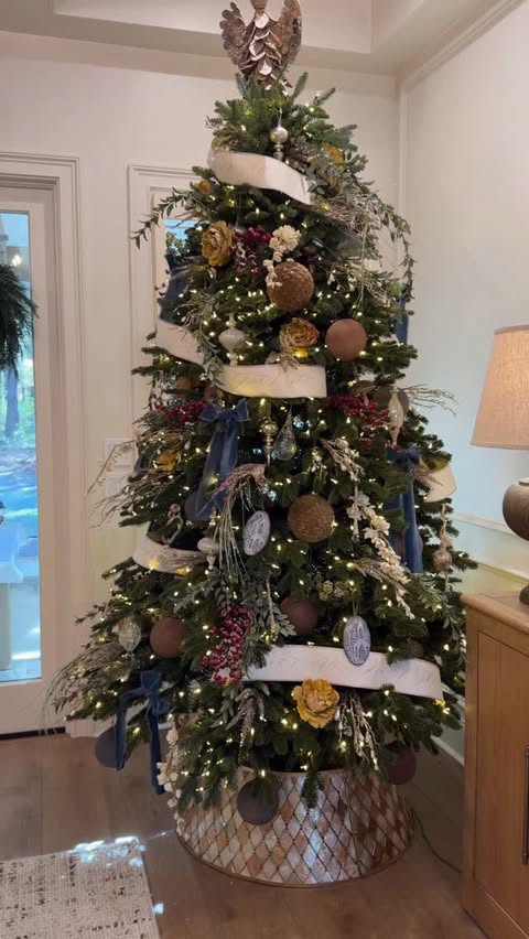 Instagram post by @thenottinghome for Balsam Hill. Caption reads: This is the flip tree from @balsamhill — and it....