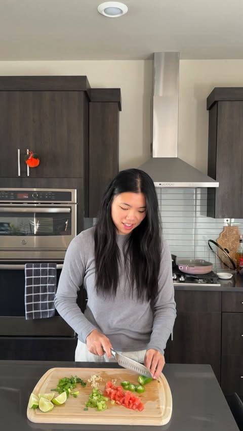 Instagram post by @sabreena.eats for HelloFresh US. Caption reads: Learning How to Cook Global Flavors at Home 🌍....