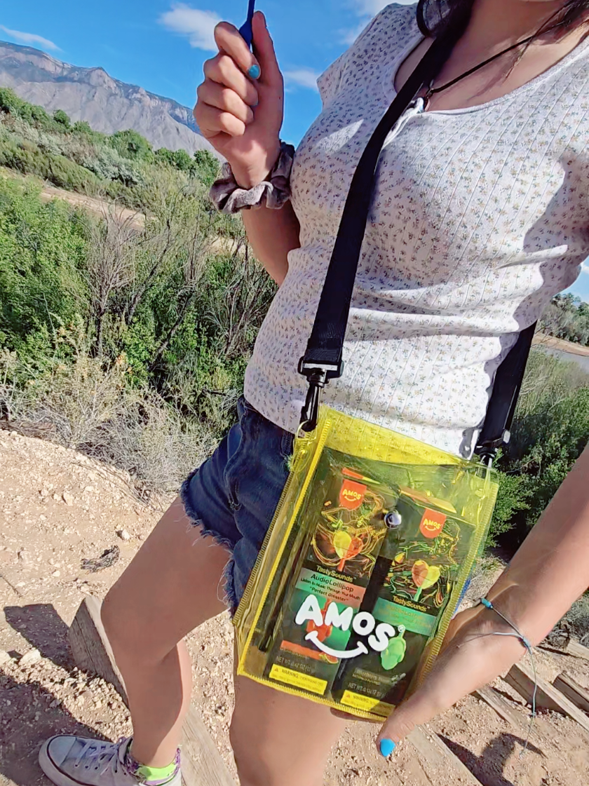 TikTok post by @koolmom223 for Amos Sweets. Caption reads: Click our link!! 🍭 @Amos Sweets #fashion....