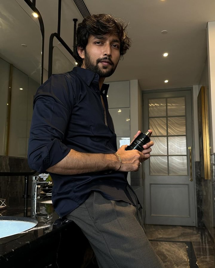 Instagram post by @rahhul_shahh for Etienne Aigner AG. Caption reads: Experience uncompromising on-the-go sophistication....