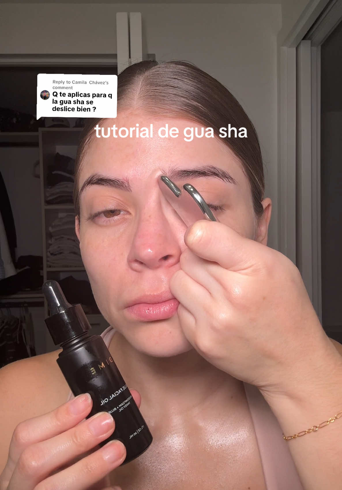 TikTok post by @nathaliarivera for DIME Beauty. Caption reads: [...] gua sha + blue facial oil de @DIME Beauty .