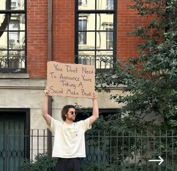 Instagram post by @dudewithsign for Heineken US. Caption reads: Huge thank you to this guy for standing in while I....