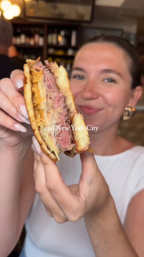 Instagram post by an influencer for Beli. Caption reads: [...] top burger vid as ranked on my @beli_eats !!....