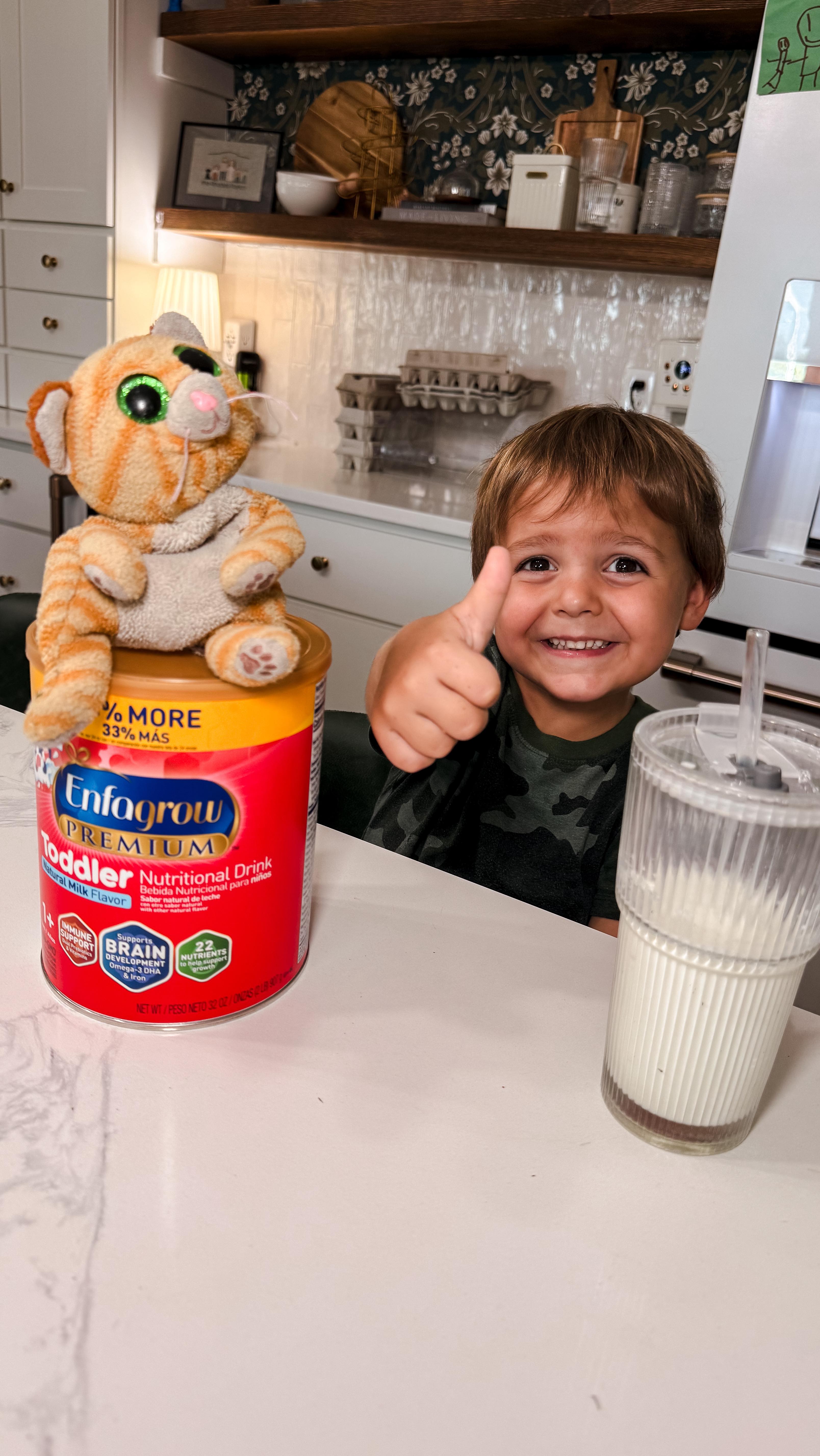 Instagram post by @woah.heather.rhodes for Enfamil. Caption reads: Farm life with kids and then adding in back to....