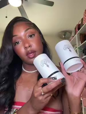 TikTok post by @armaniwellss for Eternal Perfume Oils. Caption reads: @Eternal Perfume Oils is literally my favorite....