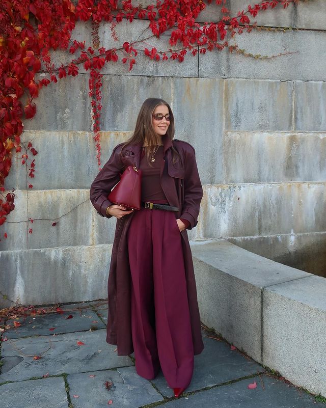 Instagram post by @ninasandbech for Elleme. Caption reads: My love for burgundy outfits continues! Ad/tags.