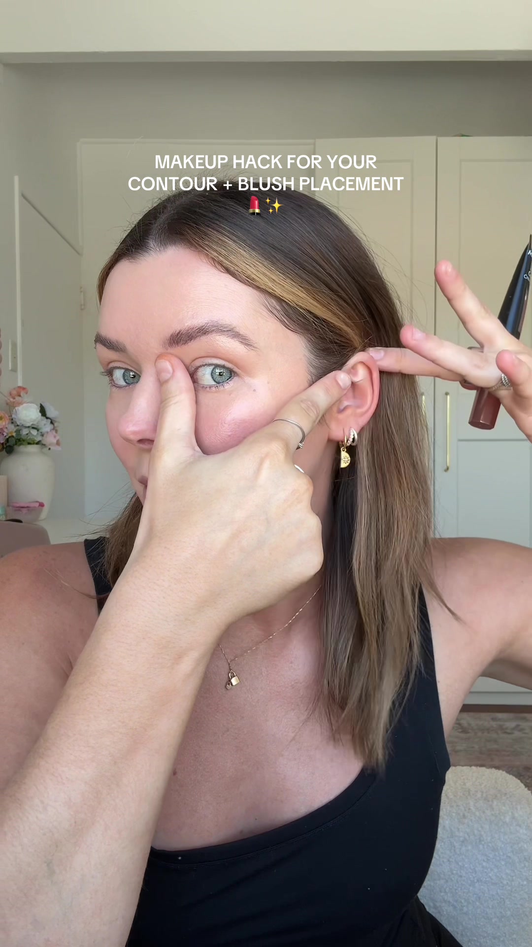 TikTok post by @kathryndenny for MCoBeauty. Caption reads: MAKEUP HACK!! If you struggle with your contour +....
