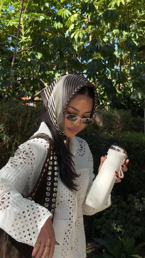 Instagram post by @aliyahwears for Stanley 1913. Caption reads: [...] bottle is part of the outfit 💅🍃....