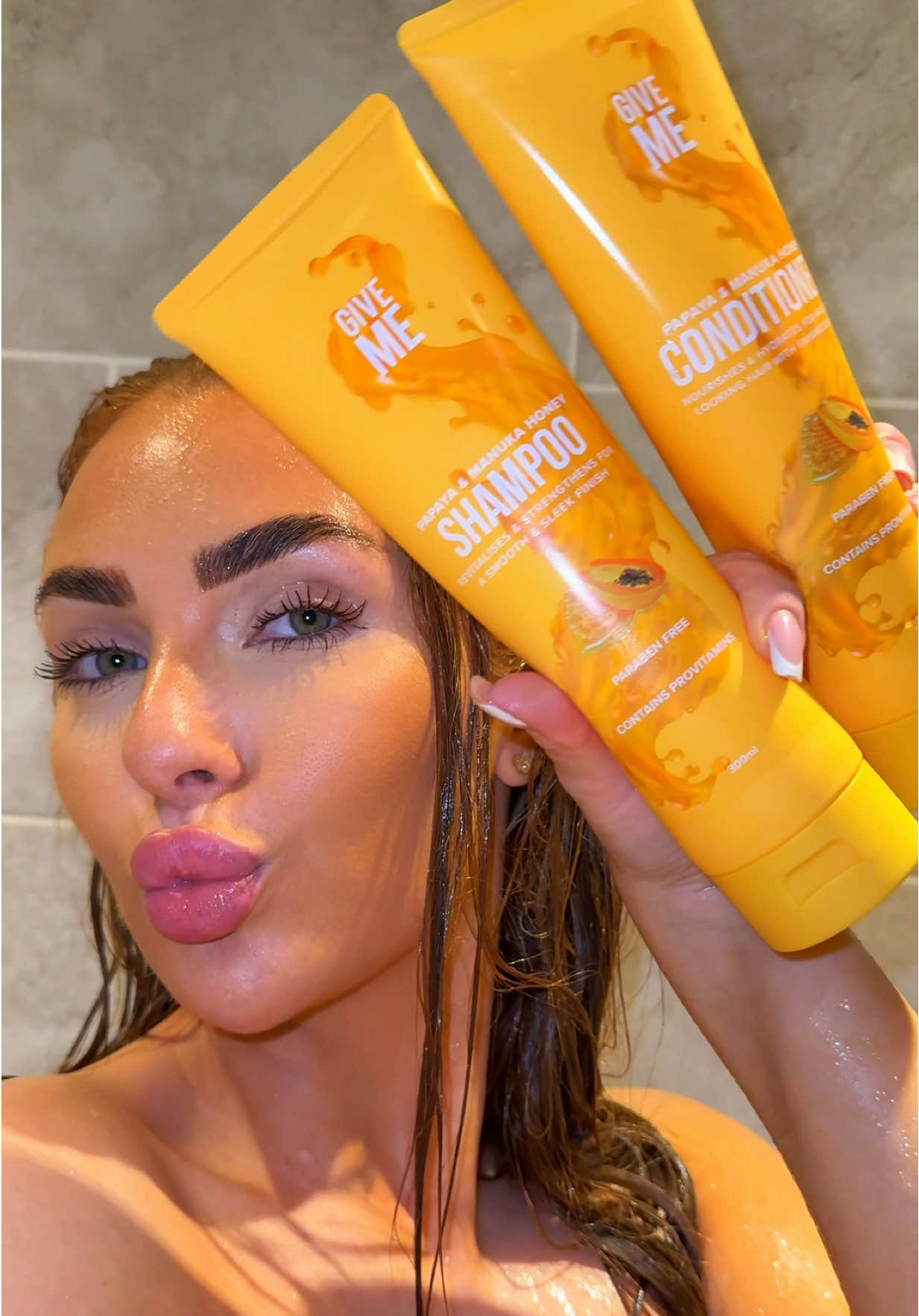 TikTok post by @demijones for Give Me Cosmetics. Caption reads: [...] Wash & style my hair with me using the @Give....