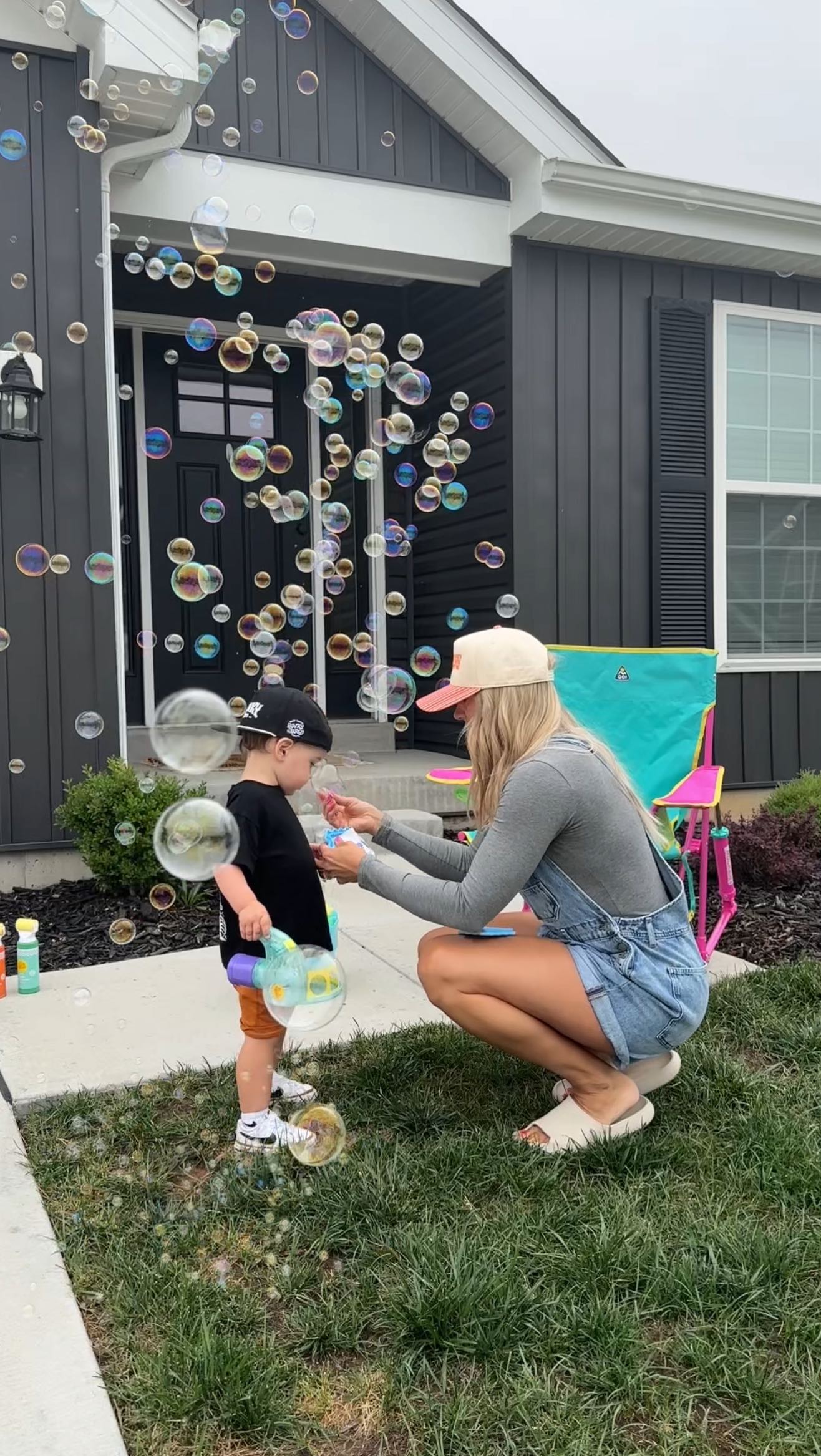 Instagram post by @__balancedwithbritt for Harvest Snaps. Caption reads: parenting hits different outside in the summer,....