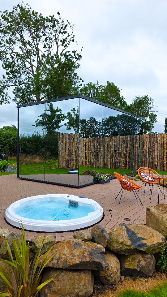 Instagram post by @hartgrovehome for Discover Northern Ireland. Caption reads: AD Come stay with me at @loughneaghmirrorhouses....