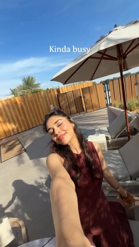 Instagram post by @eishasingh for Visit Abudhabi. Caption reads: [...] I’m not picking up.😏 #InAbuDhabi....