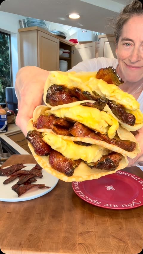 Instagram post by @seattlehanddoc for Pyrex. Caption reads: Candied Bacon, Egg & Cheese Crêpe Nothing like a....